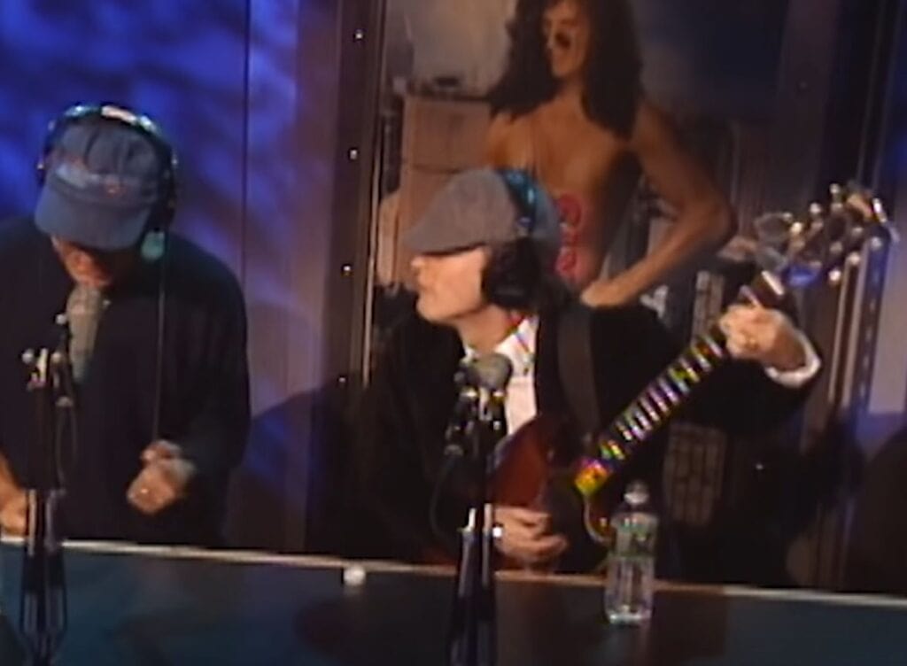 Angus playing a Gibson SG Junior on Howard Stern. 