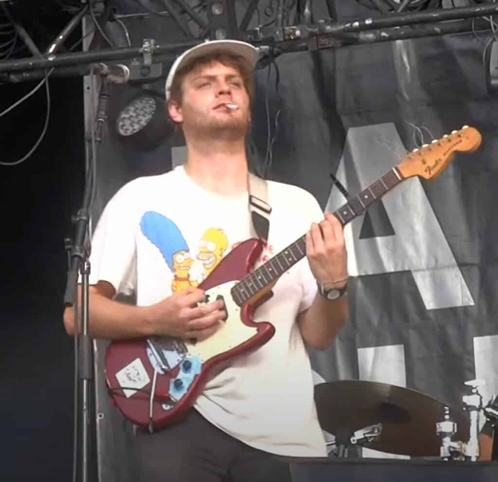Mac DeMarco playing his Dakota red Fender Mustang at La Route du Rock in 2014.
