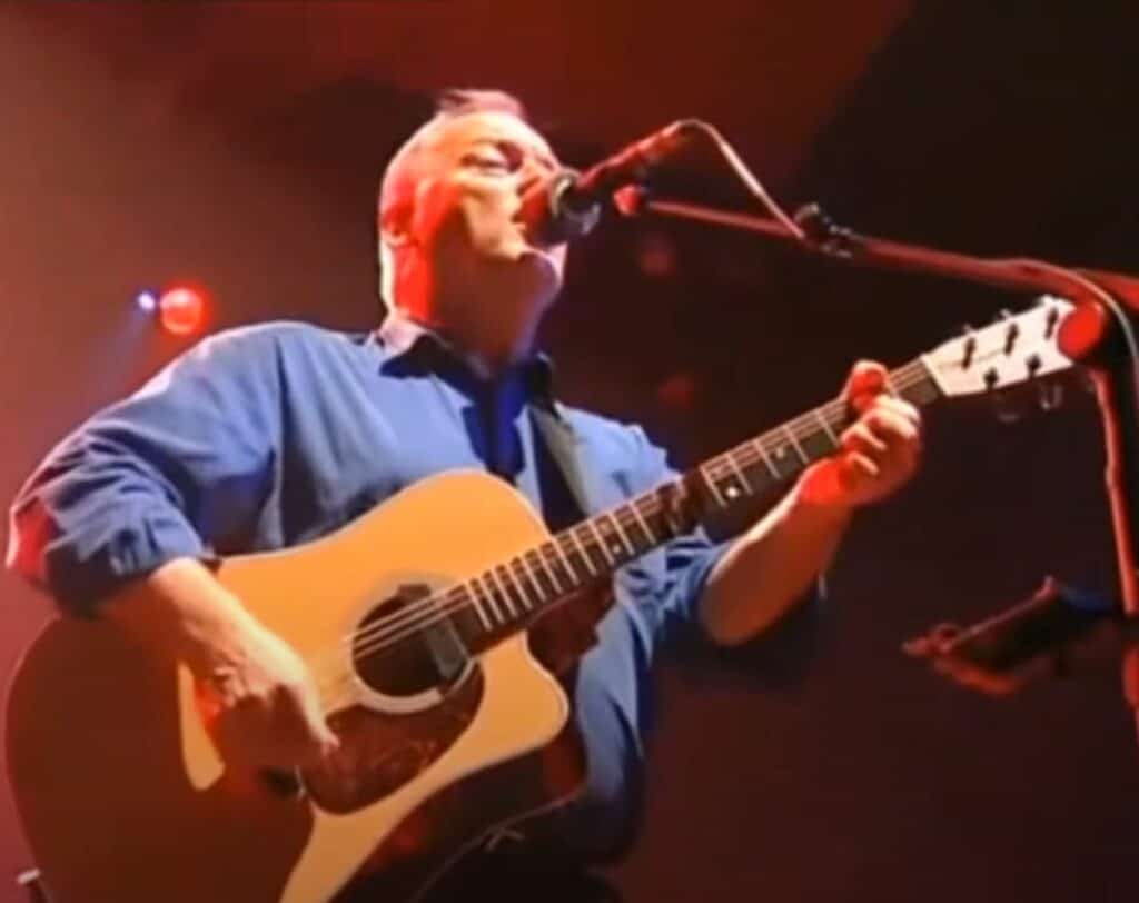 David playing his Martin DC-28E guitar at the Royal Festival Hall in 2002