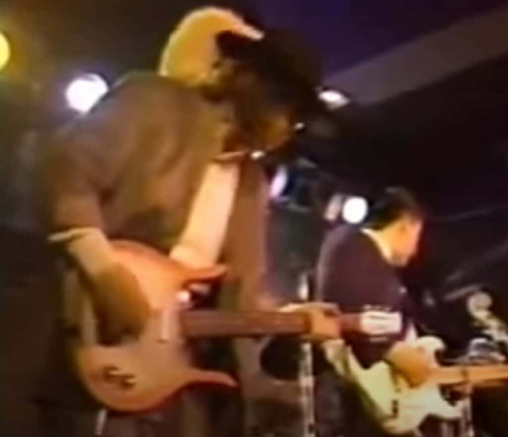 Stevie with a Danelectro Longhorn 6-string bass guitar.